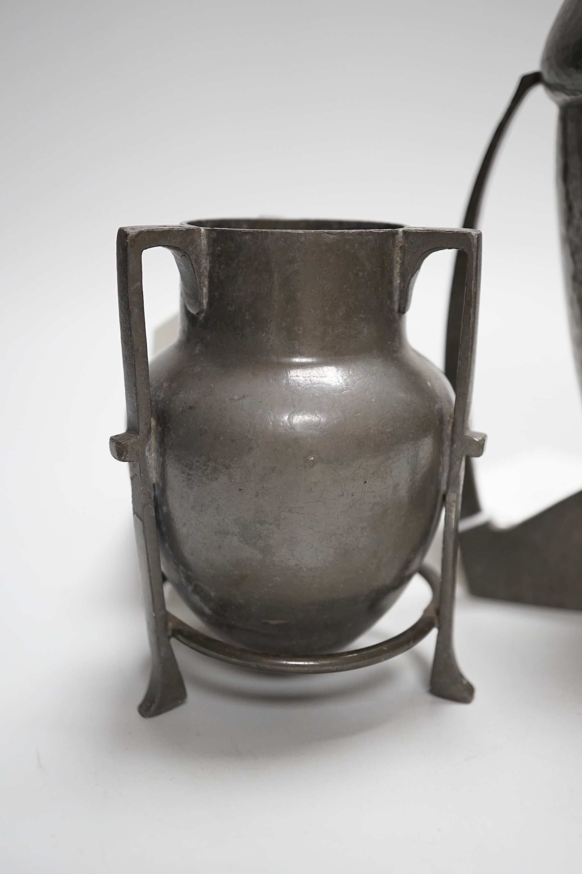 A Liberty’s Tudric Archibald Knox pewter vase and similar Connell pewter pot, Tudric vase 18.5cm high